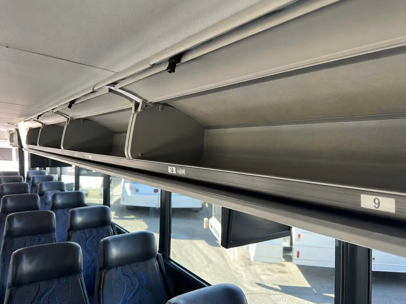 east point 56 passenger charter bus overhead storage